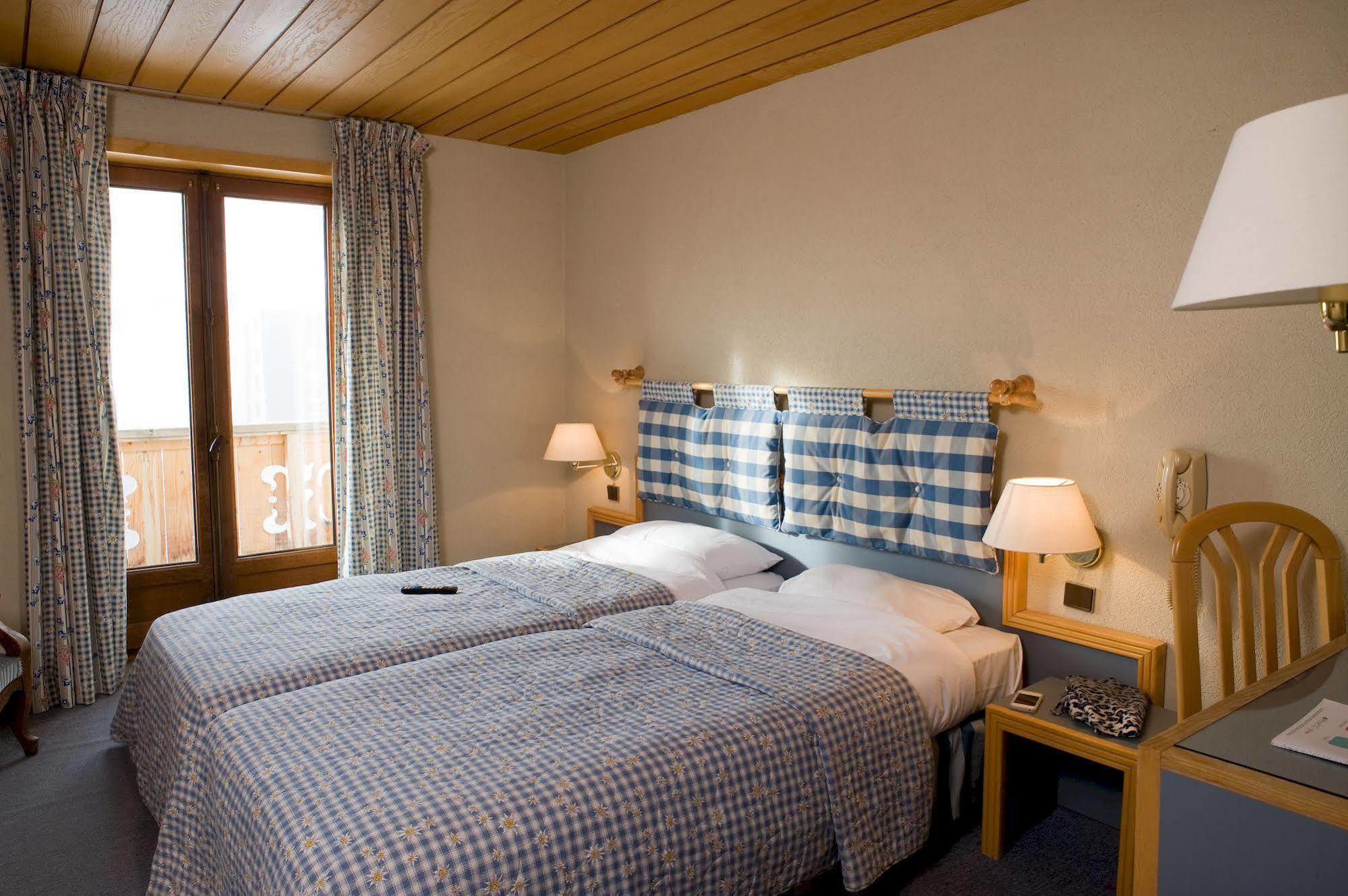 Madame Vacances Hotel Le Christina Alpe d'Huez Екстер'єр фото